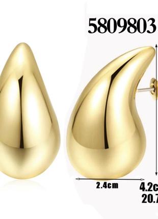 Трендові сережки краплі 💧 4.2*2.4 см золотого та срібного кольору4 фото