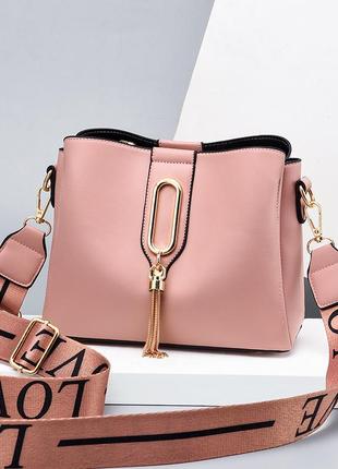 Яскрава жіноча сумочка на плече. жіноча сумка