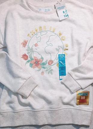 Толстовка 134 см на 8-9 років,нова фірма прімарк,колір молочний з прінтом квітковим.