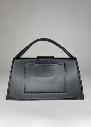 Чорна маленька жіноча сумка-кросбоді з ручкою та довгим ременем5 фото