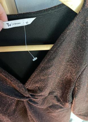 Сияющая блуза с узлом и объемными трубами с металлизированным волокном2 фото