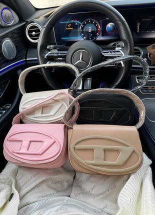 Женская сумка diesel бежевая / коричневая / розовая / черная10 фото