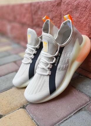 Кросівки adidas zx boost світло сірі з помаранчевим1 фото