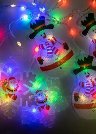 Светодиодная гирлянда xmas штора фигурки 3d снеговика и снежинки 3mx70cm 95l мультицветная m5 фото