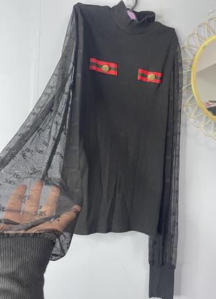 Блуза з прозорими рукавами