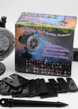 Вуличний лазерний проектор для новорічного декору laser light star shower 518 (12 слайдів)