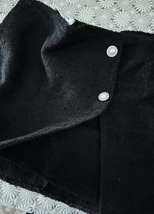 Твідова спідниця