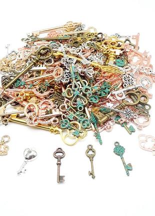 Набір металевих підвісок 100г, шарми шарміки, ключі, мікс1 фото
