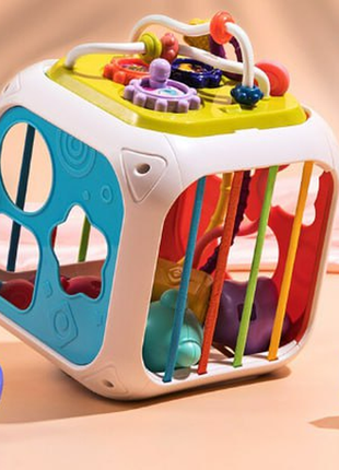 Розвиваючий центр мультикуб 7в1 688-62 багатофункціональна іграшка логічний бізі куб з ксилофоном2 фото