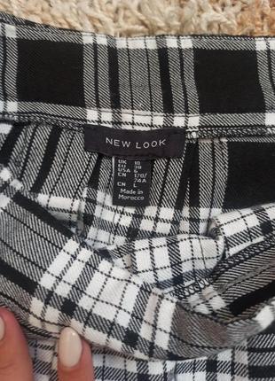 Тепла тенісна спідниця міні у чорно-білу клітинку new look4 фото