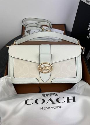 Кожаная сумка в стиле coach
