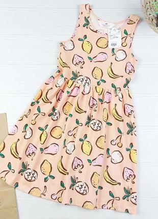 Светло-маранчовое платье с фруктовым принтом от h&amp;m на 6-8 лет, 116-128 см.1 фото