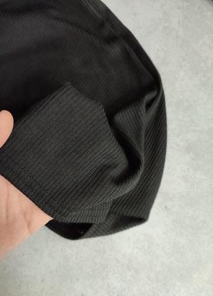 Чорний розкльошений комбінезон костюм кльош з вирізом без рукавів в рубчик plt9 фото