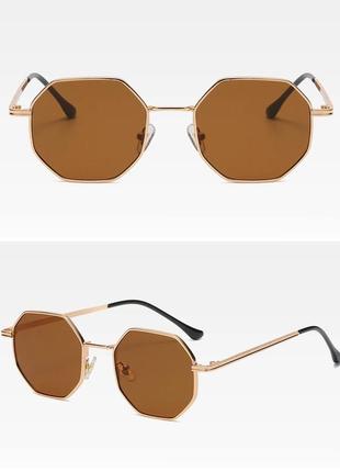Тренд стильні жіночі коричневі сонцезахисні окуляри сонячні очки антиблик металева оправа5 фото