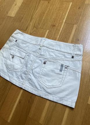Женская джинсовая супер мини юбка на низкой посадке m размера4 фото