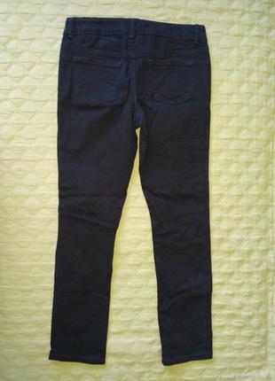 Черные джинсы скинни faded glory с модными потертостями и дырками на коленях на 10-12 лет3 фото