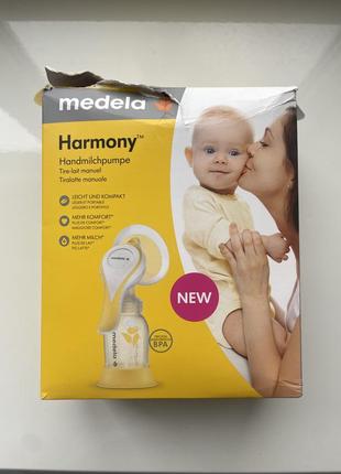 Молокоотсос medela