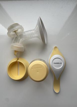 Молокоотсос medela