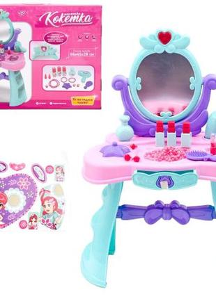 Трюмо дитяче. зі звуковити та світловими ефектами. комплектація - стіл, прикраси, фен. упаковка - коробка. розмір - 54х9,5х43 см.