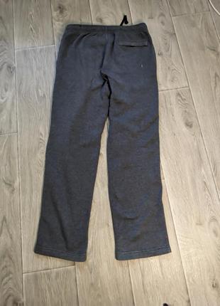 Широкие брюки nike темно серые размер м4 фото