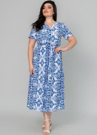 Легка літня штапельна жіноча сукня міді великих розмірів