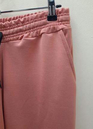 Спортивные штаны женские коралловые на манжете и-5493.размеры: 48,50,523 фото