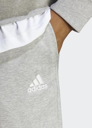Оригінальні легкі штани adidas ess jersey tapered open hem / ic94118 фото