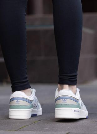 Жіночі білі кросівки adidas drop step4 фото