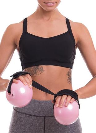 М'яч обважнений із манжетом pro-supra weighted exercise ball 030-1_5lb 11 см рожевий10 фото