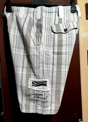 Брендовые шорты в клетку.