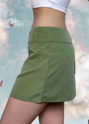 Новая короткая мини юбка на низкой посадке оливкового цвета2 фото