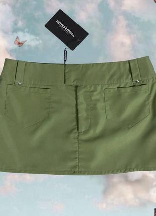 Новая короткая мини юбка на низкой посадке оливкового цвета3 фото