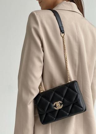 Женская сумка chanel black gold7 фото