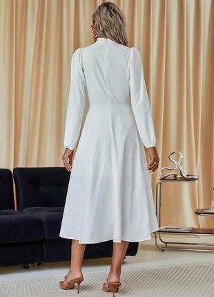 Ошатне біле жіноче плаття міді2 фото