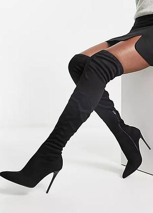 Чорні стрейчеві ботфорти на шпильці