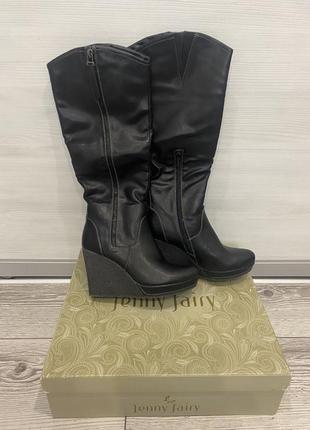 Высокие сапоги нового состояния