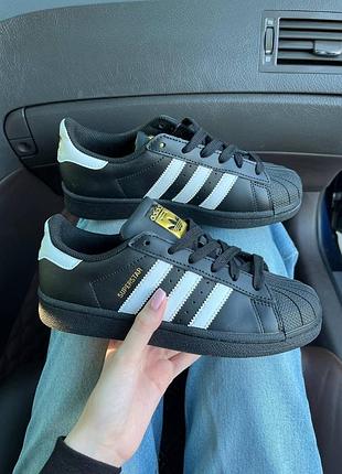 Adidas superstar black white