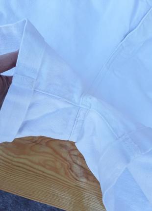 Білі жіночі джинссові шорти 36 / 83 фото