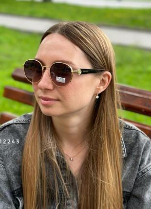 Сонцезахисні окуляри жіночі4 фото