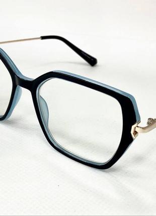 Коригуючі окуляри для зору жіночі трапеціі фотохромні в пластиковій оправі з золотистою фурнітурою тоненькі дужки
