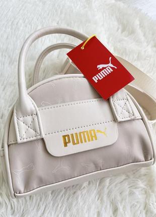 Сумка від бренду puma нова з біркою в бежевому кольорі4 фото