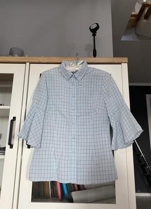 Сорочка блакитного кольору в клітинку