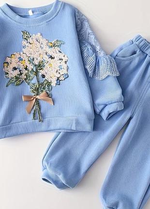 Красивый голубой костюм букет в мелкий рубчик с оборками на рукавах на 1-1,5 года
