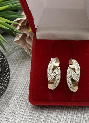 Срібні сережки з пластинами із золота