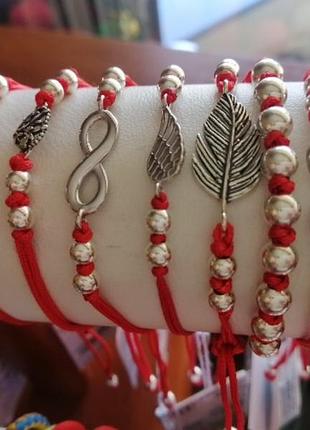 Красная нить со вставками серебра