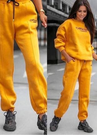 Спортивні костюми жіночі