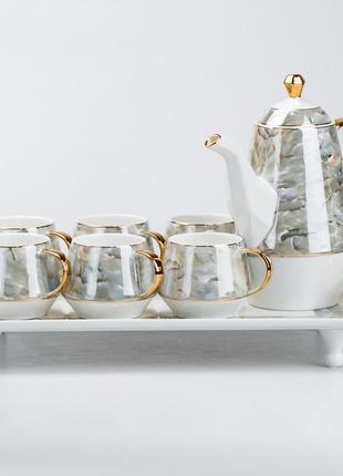 Чайный сервиз на подносе 6 чашек и заварочный чайник на подставке2 фото