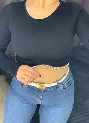 Черная кофточка с бахрамой со стразами