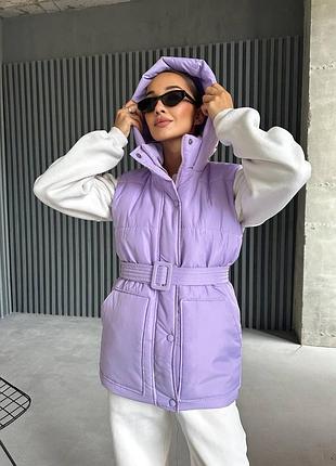 Жіноча жилетка