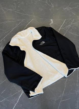 Двостороння куртка tnf